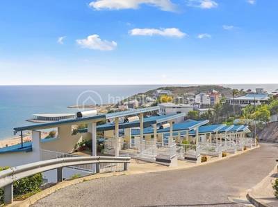 Coastwatchers Court | Town | Apartment Buildings For Rent with 2 Parking Space